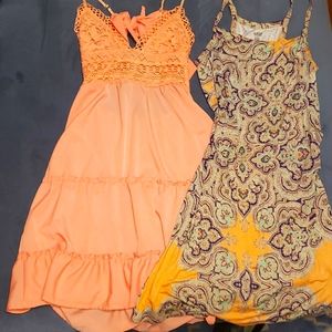 Two sz M midi-dresses